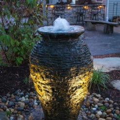 Aquascape Stacked Slate Urn Landscape Fountain Kits -pond shop aquascape stacked slate fountain urn night 1000 59819.1666639560